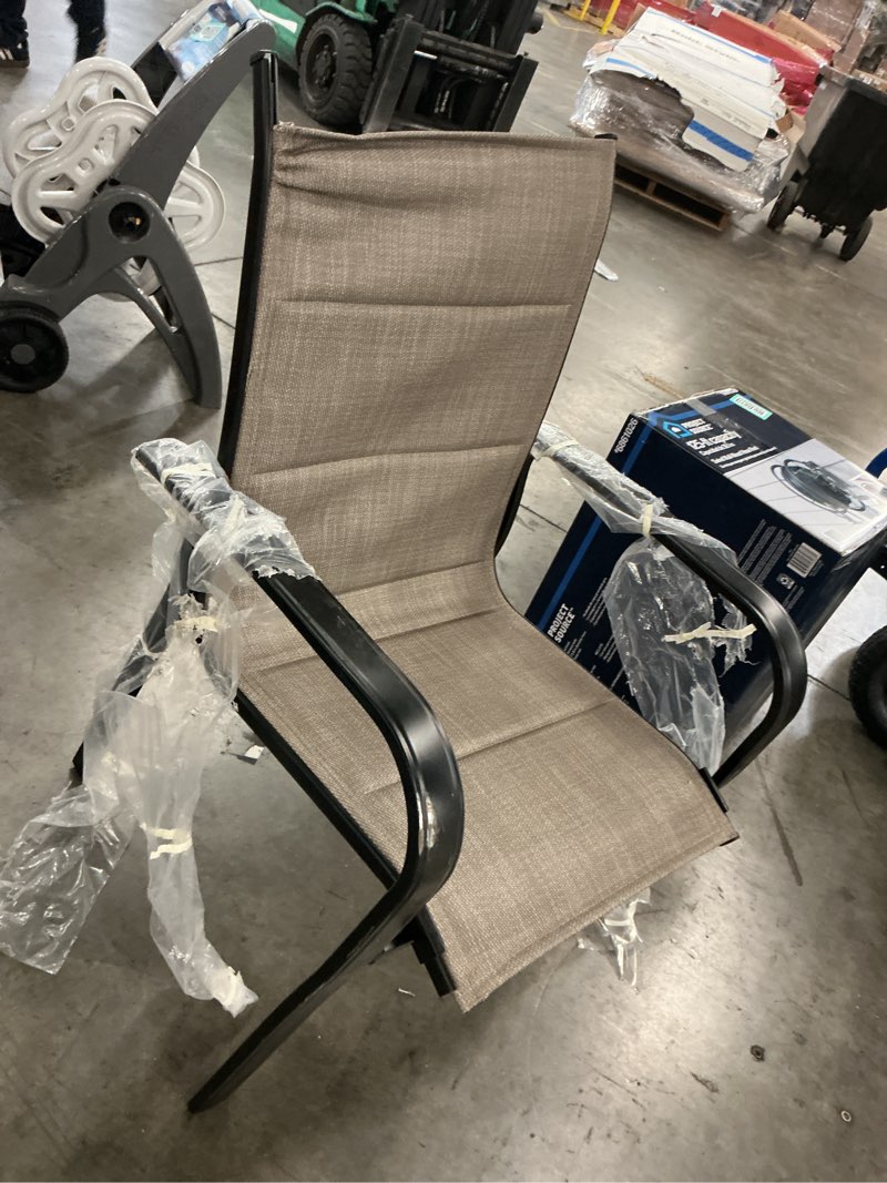 Condition photo showing As Is for style selections pelham bay stackable black metal frame stationary dining chair with tan sling seat