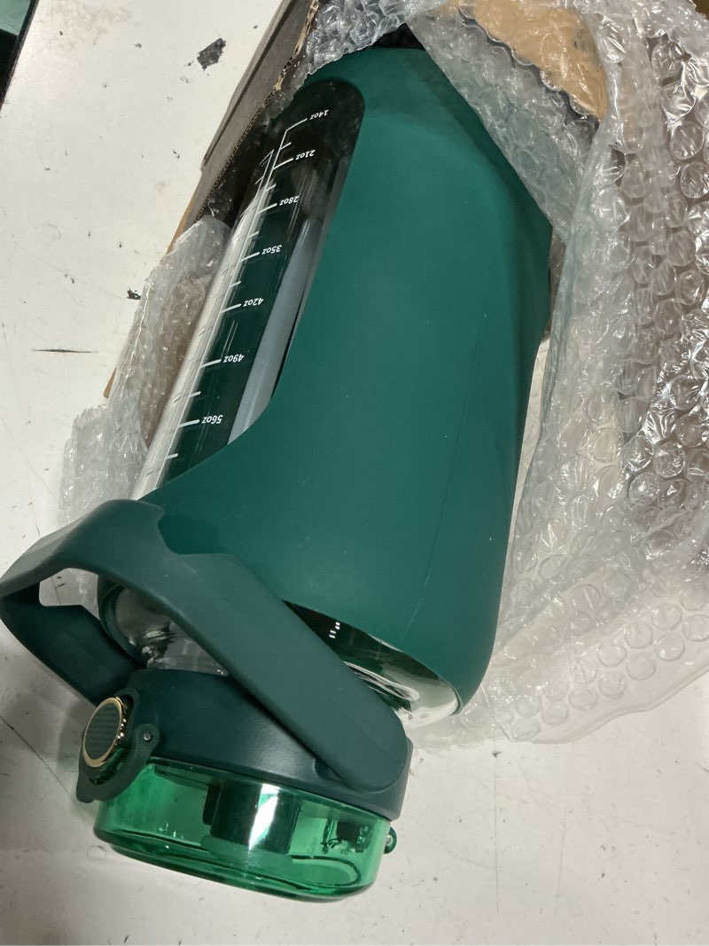 Condition photo showing Good Condition for 74oz glass water bottle with 2-in-1 straw lid large gallon water bottle with time marker & removable silicone sleeve,wide mouth bpa-free borosilicate bottle for gym, workout & daily use dark green 74 ounces