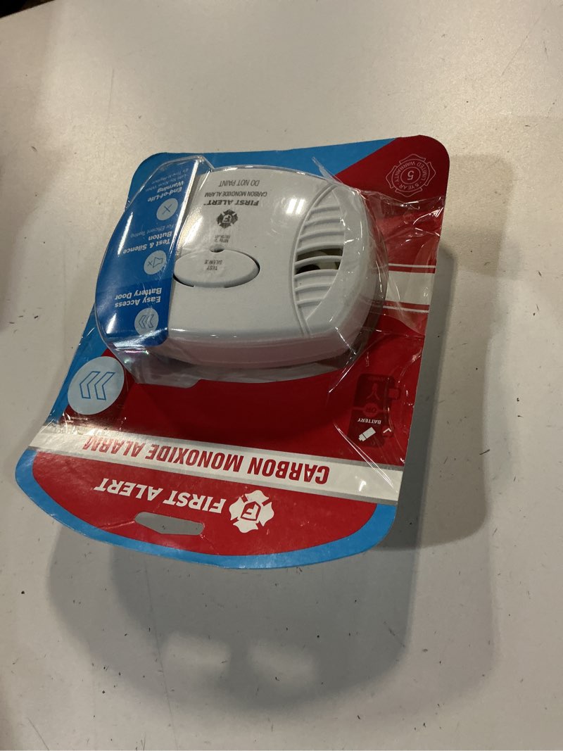 Condition photo showing New/Like New for basic co alarm w/ 9v battery