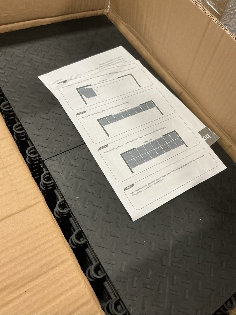 Condition photo showing New/Like New for Garage Floor Tiles Interlocking Garage Flooring Tiles Pack of 48 Antislip Oil and Stain Resistant for Garages Shop Floors Basements 40000 LBS Load Capacity 12x12 Inch Black Color
