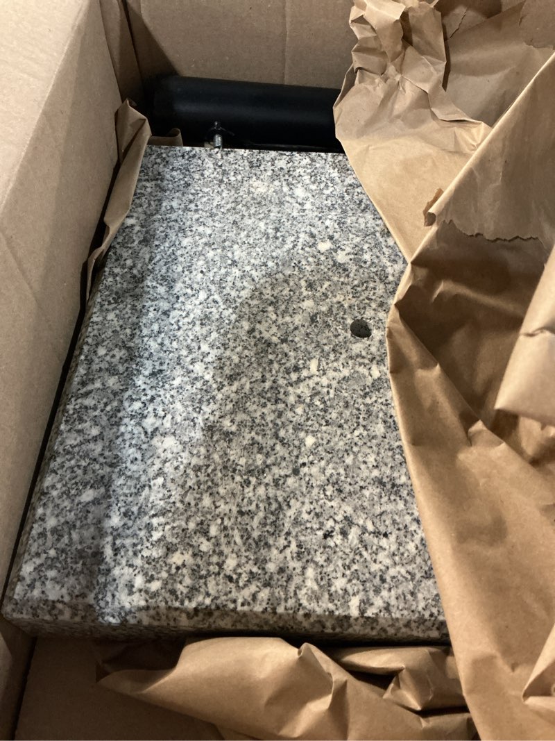 Condition photo showing Good Condition for us weight 35lb marble umbrella base