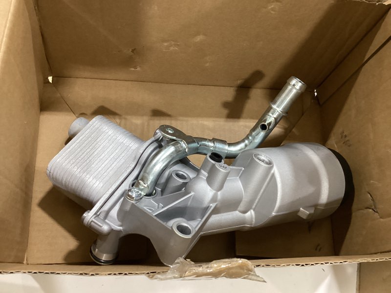 Condition photo showing Good Condition for engine oil cooler filter housing assembly with gasket compatible with 2011-2021 chevy cruze sonic trax buick encore 1.4l replaces 918-428 88179-91400
