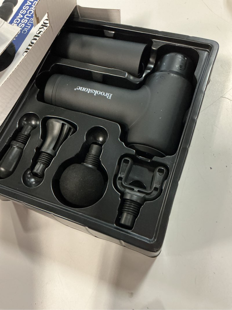 Condition photo showing As Is for brookstone deep tissue massage gun for pain relief & muscle recovery – 9-speed handheld percussion massager, 4 heads, type-c rechargeable, quiet, 3200 rpm, shockproof design