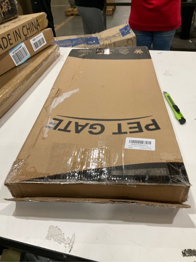 Condition photo showing Good Condition for Malier Indoor Dog Gate with Door, 26-41" Extra Wide Full Metal Pet Gate Short Dog Gate for Stairs, Pressure Mount 10'' Tall Small Puppy Low Gate Easy Step Over for Doorways Black 10''H × 26''- 41''W