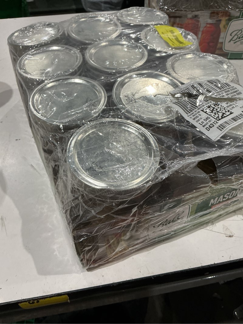 Condition photo showing As Is for wide-mouth mason jars with closures, pint, 12-pk