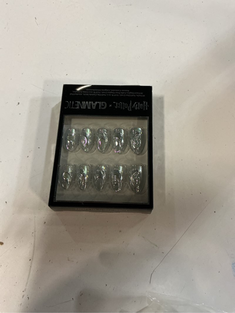 Condition photo showing New/Like New for Glamnetic Press On Nails x Harry Potter™ - Unicorn Blood | Short Almond Fake Nails with Silver Chrome & 3D Swirl Design, Salon Quality Officially Licensed | 15 Sizes - 30 Nail Kit with Glue 2 - Unicorn Blood