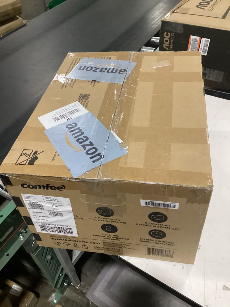 Condition photo showing New/Like New for COMFEE' EM720CPL-PMB Countertop Microwave Oven with Sound On/Off, ECO Mode and Easy One-Touch Buttons, 0.7cu.ft, 700W, Black 0.7 Cu.Ft Black