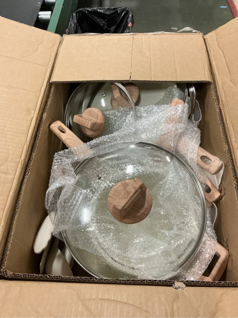 Condition photo showing As Is for CAROTE 16 Piece Pots and Pans Set Nonstick, White Granite Cookware Sets Induction Cookware, Non Stick Cooking Set w/Frying Pans & Saucepans (PFOS, PFOA Free) Cream White 16 Piece