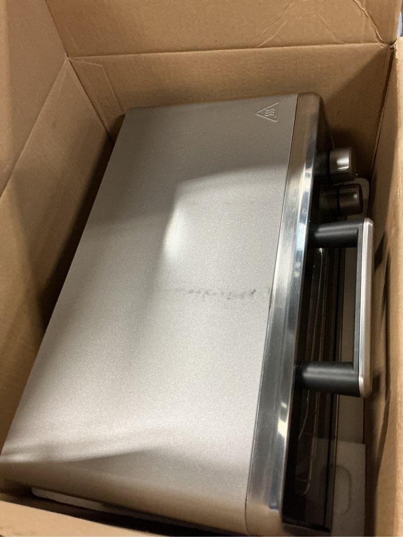 Condition photo showing As Is for black+decker crisp ‘n bake pro stainless steel 4-slice air fryer toaster oven