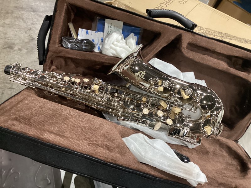 Condition photo showing New/Like New for eastrock alto saxophone nickel e flat sax full kit for students beginner with carrying case,mouthpiece,mouthpiece cushion pads,cleaning cloth&cleaning rod,white gloves,neck strap