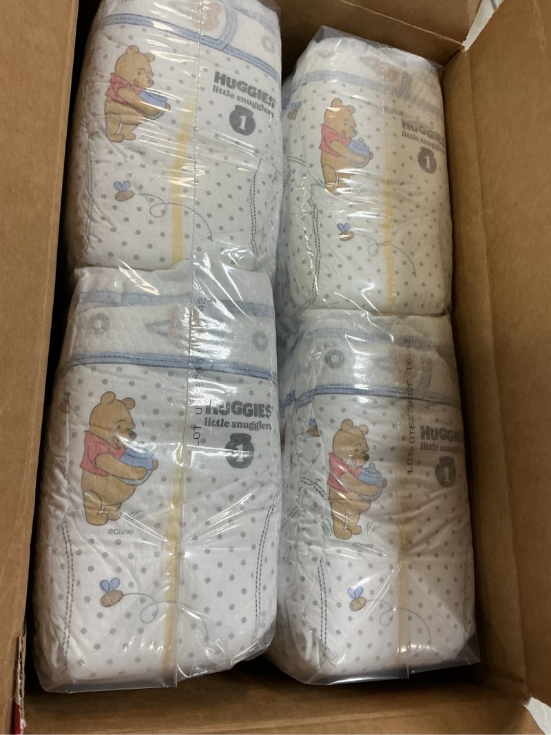 Condition photo showing Good Condition for Huggies Size 1 Diapers, Little Snugglers Baby Diapers, Size 1 (8-14 lbs), 96 Count, Packaging May Vary