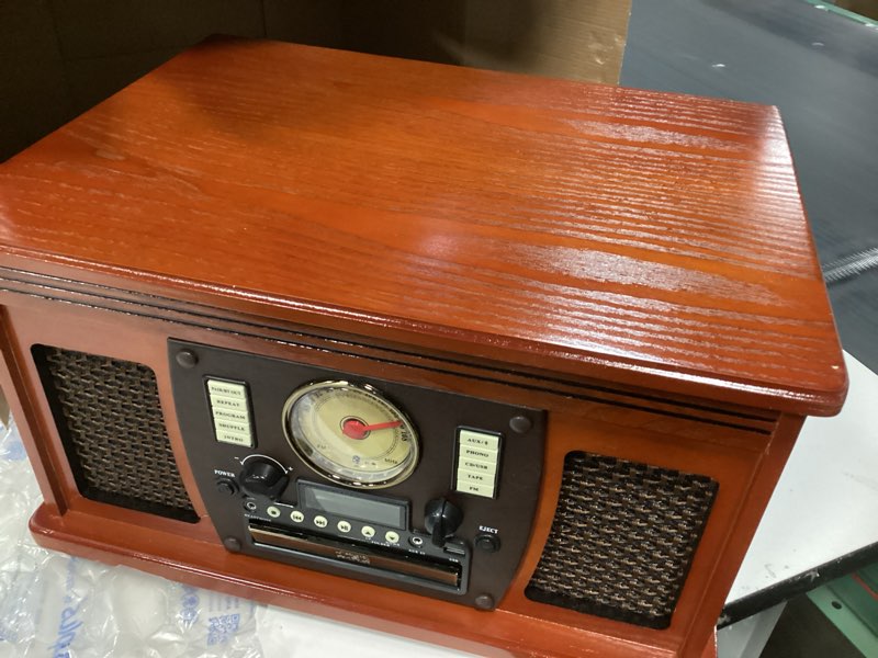 Condition photo showing Good Condition for Victrola Navigator 8-in-1 Bluetooth Record Player with Built-in Speakers– 3 Speed Turntable, CD Player, Cassette, FM Radio, USB, RCA Out, Headphone Jack, Wireless Music Streaming, Real Wood (Mahogany)