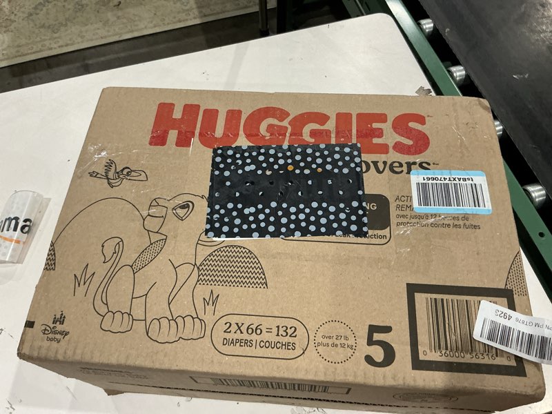 Condition photo showing New/Like New for huggies size 5 diapers, little movers baby diapers, size 5 (27+ lbs), 132 count (2 packs of 66), packaging may vary size 5 132