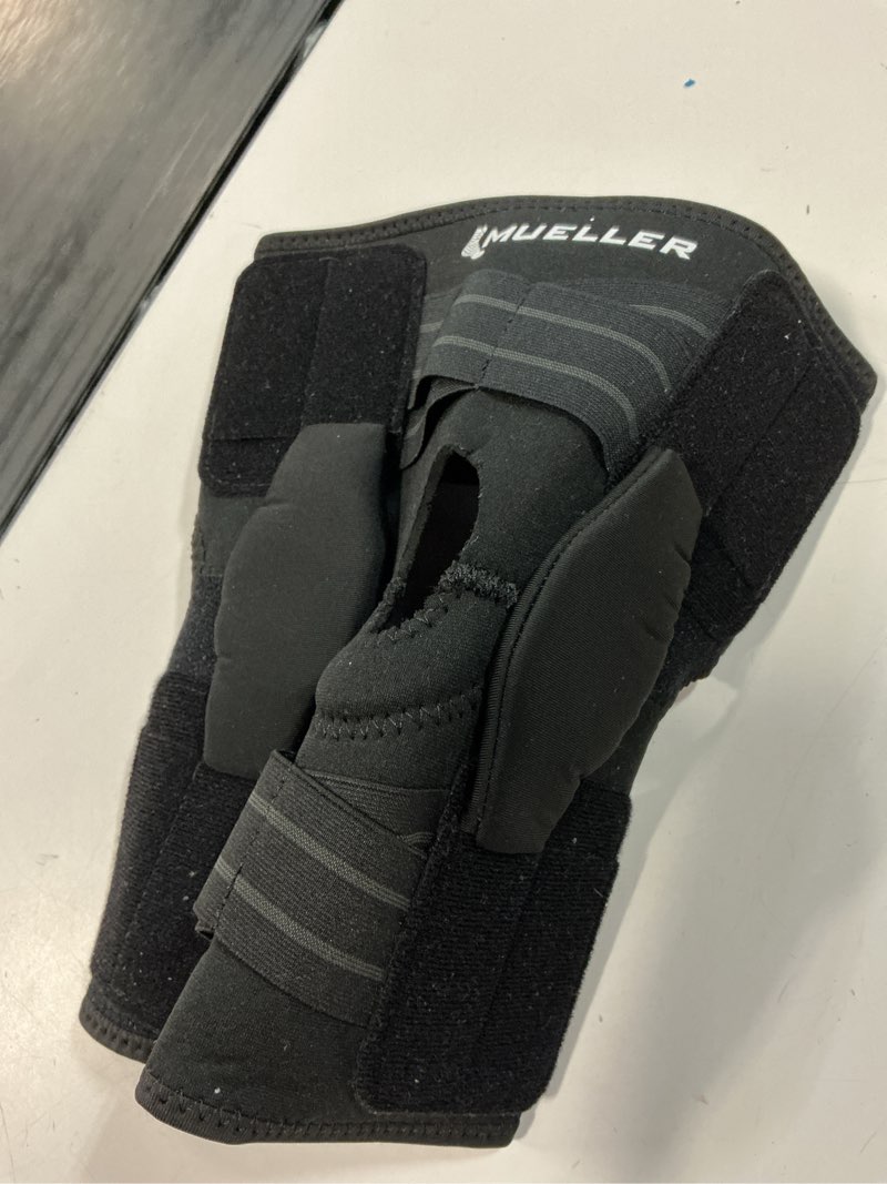 Condition photo showing Good Condition for mueller adjustable hinged knee brace, black, one size fits most