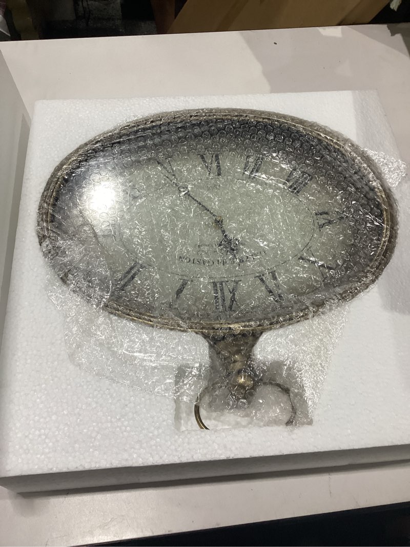 Condition photo showing New/Like New for vintage decorative wall clock - 16 inch, distressed gold, oval pocket watch design, roman numerals, battery operated, large antique style for living room, kitchen, bedroom decor gold 16''