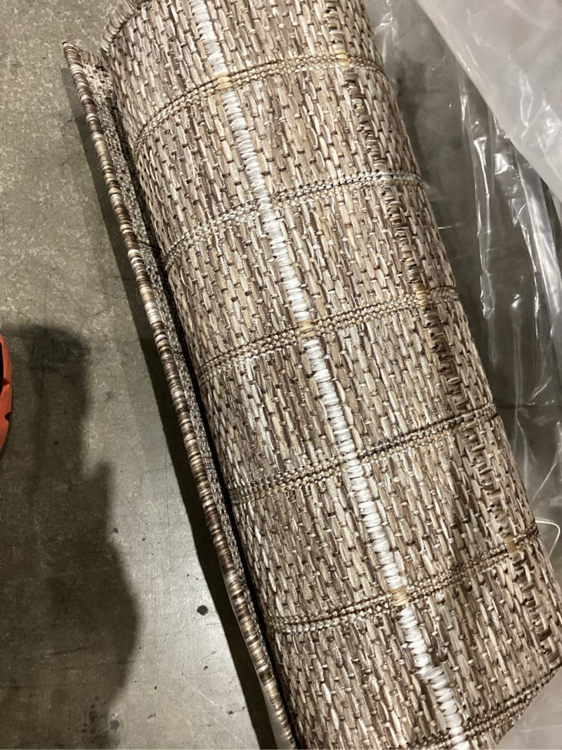Condition photo showing Good Condition for loloi birch collection bir-02 natural/bark 5' x 7'-3", .25" pile height, area rug, indoor/outdoor, durable, neutral, easy clean, rug for patio, deck, entry, balcony, outdoor space natural / bark 5' x 7'3" (rectangular)