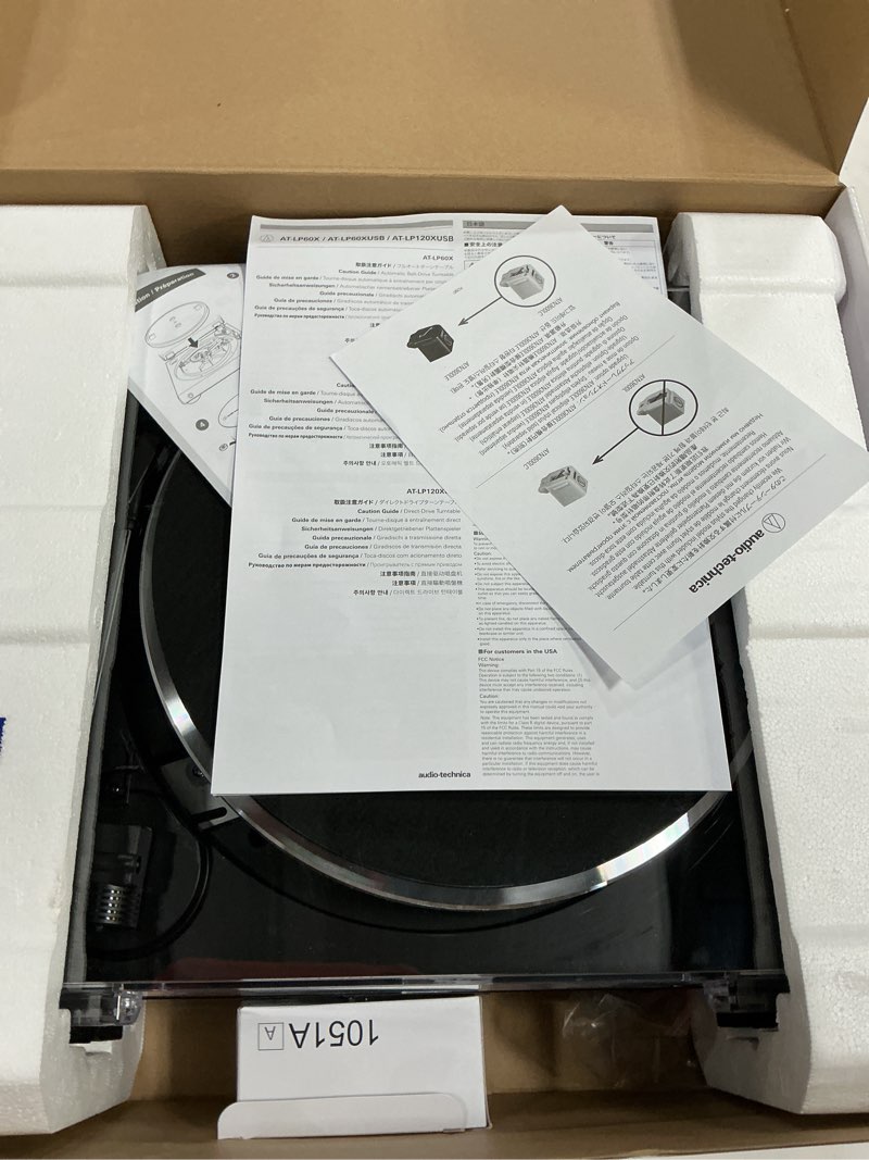 Condition photo showing As Is for audio-technica at-lp60x-bk fully automatic belt-drive stereo turntable, black, hi-fi, 2 speed, dust cover, anti-resonance, die-cast aluminum platter black wired turntable