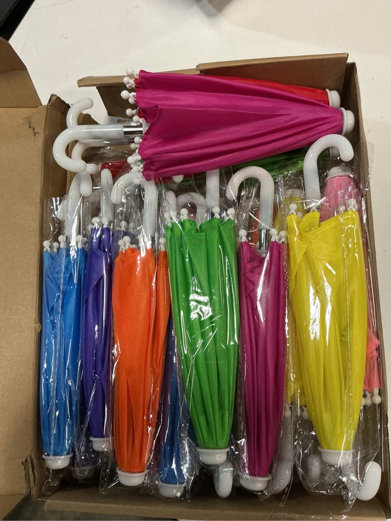 Condition photo showing item condition for Jenaai 24 Pcs 10.8 Inch Multicolor Mini Umbrellas for Decorations Small Colorful Rainy Umbrella Decorations Miniature for Dolls Home Decor Accessories (Cute Style) 24 Cute Style