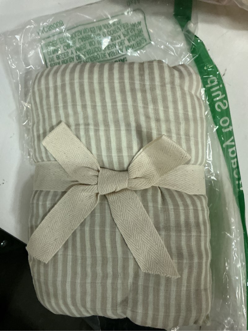 Condition photo showing Good Condition for taupe stripe muslin crib sheet by mebie baby, soft and breathable bed sheets for babies, modern neutral bedding for cribs, standard crib mattress fitted sheet, great for boy or girl room or nursery