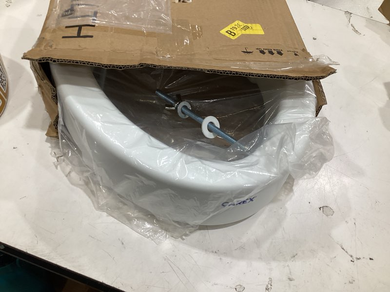 Condition photo showing Good Condition for carex toilet seat riser, adds 5 inches of height, elevated and raised toilet seat with 300 lbs capacity, standard riser for elderly and handicap, universal, slip-resistant, white 5 inch (pack of 1) toilet seat riser