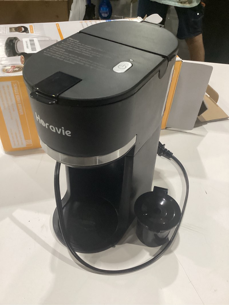 Condition photo showing Good Condition for used horavie small single serve coffee maker for k cup and grounds, fast brew one cup coffee machine with one button, 6 to 12 oz. brew sizes, perfect for home and travel, black black 9.45 inches