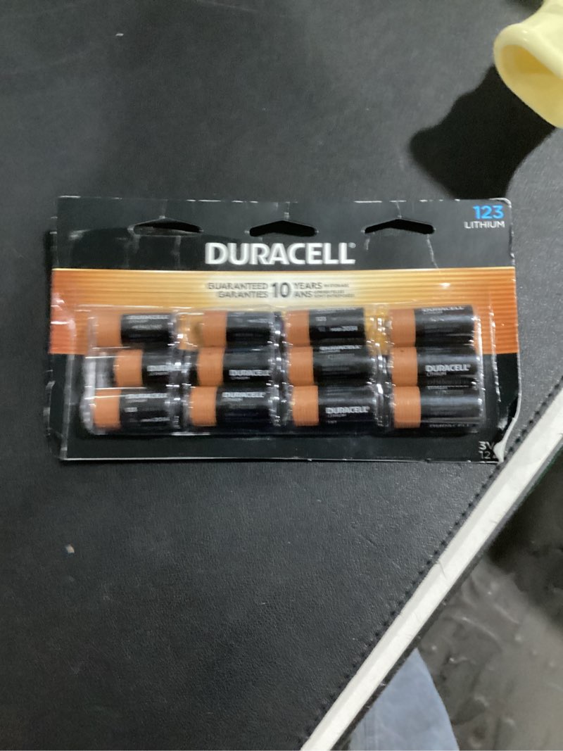 Condition photo showing As Is for Duracell CR123A 3V Lithium Battery, 12 Count (Pack of 1), 3 Volt High Power for Home Safety, Security Devices, Flashlights, Smoke Alarms, Home Automation