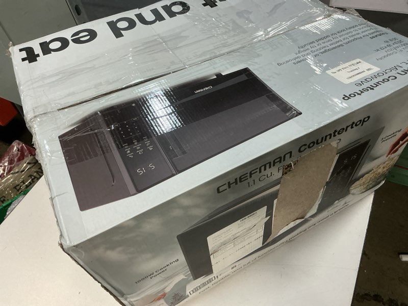 Condition photo showing Good Condition for farberware 0.7 cu. ft. countertop microwave oven – 700 watts power, auto cook settings, defrost, easy clean and child safety lock - stainless 0.7 cu. ft. stainless steel
