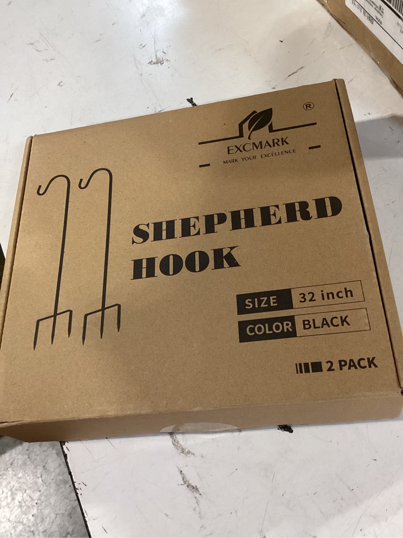 Condition photo showing As Is for excmark 2 pack shepherd hook adjustable height 31/24/16’’ 1/2 inch thick use at weddings, hanging solar lights, lanterns, bird feeders, metal hanger hook (black, 31 inch). u.s. patent. 31 inch black