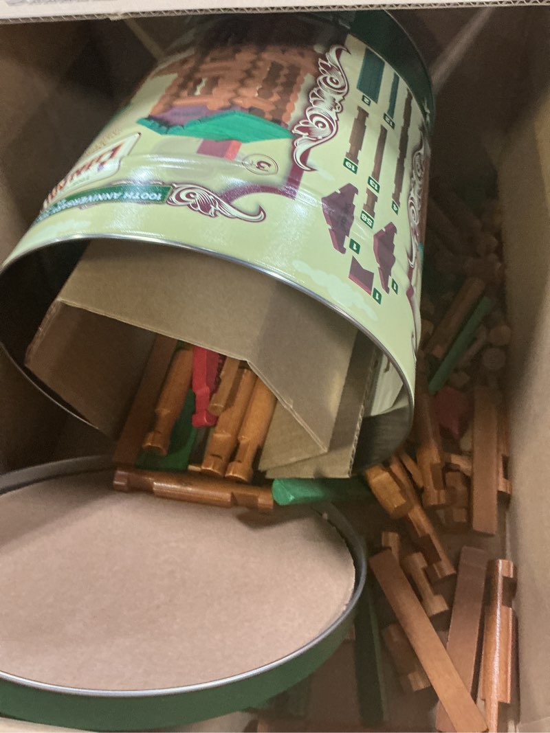 Condition photo showing As Is for Lincoln Logs 100th Anniversary Tin