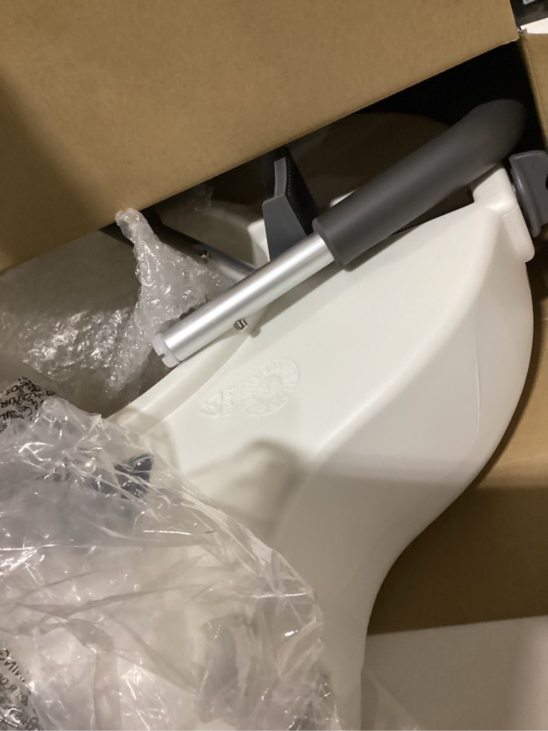 Condition photo showing As Is for Bath SafetyRaised Toilet Seat Product Description: Elev.Toilet Seat w/ RemArms,RTL,1 EA