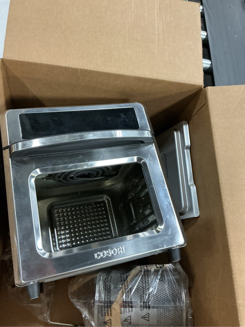 Condition photo showing As Is for COSORI 11-in-1 Air Fryer Oven , 13Qt Small Footprint Airfryer combo with Rotisserie, Toast, Bake, Roast, Reheat Functions and more, Recipe Book & 6 Accessories Included, Perfect for Small Contertop