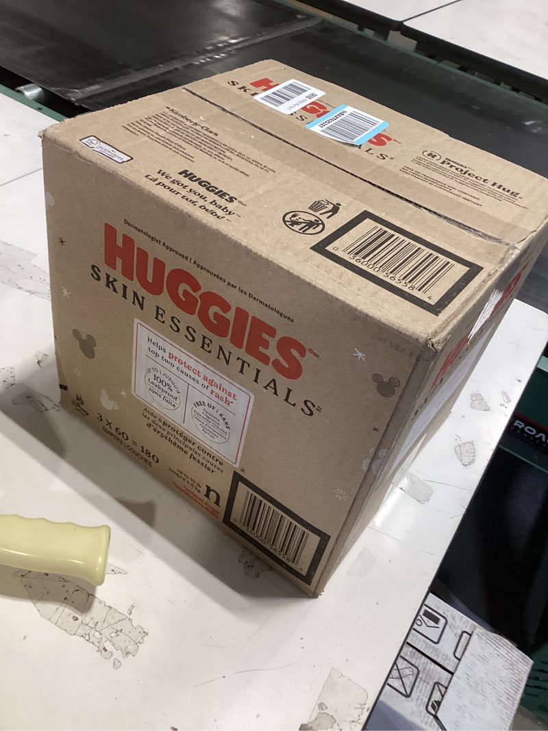 Condition photo showing New/Like New for Huggies Size Newborn Diapers, Skin Essentials Baby Diapers, Size Newborn (6-9 lbs), 180 Count (3 Packs of 60), Packaging May Vary Newborn 180
