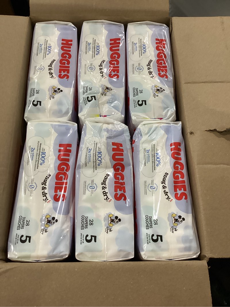 Condition photo showing New/Like New for Huggies Size 5 Diapers, Snug & Dry Baby Diapers, Size 5 (27+ lbs), 168 Count (6 Packs of 28), Packaging May Vary Size 5 168