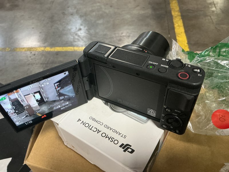 Condition photo showing As Is for sony zv-1 digital camera for content creators, vlogging and youtube with flip screen, built-in microphone, 4k hdr video, touchscreen display, live video streaming, webcam camera only black