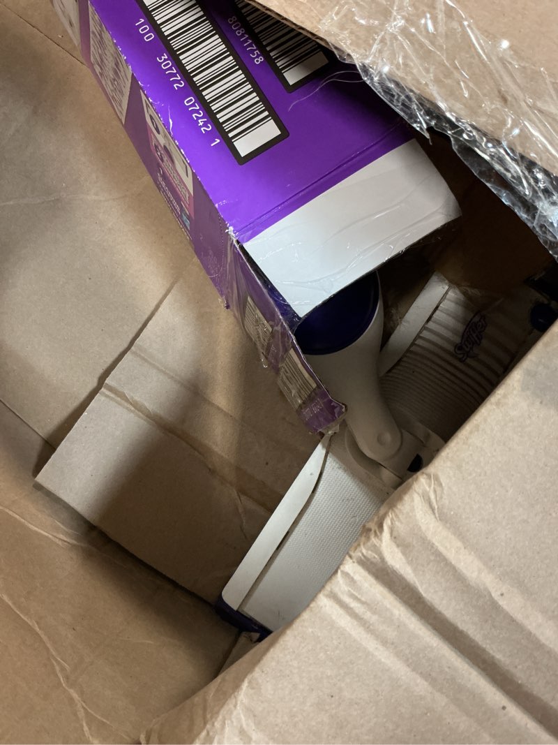 Condition photo showing As Is for swiffer powermop multi-surface mop kit for floor cleaning, fresh scent, mopping kit includes powermop, 2 mopping pad refills, 1 floor cleaning solution with fresh scent and 2 batteries purple and white