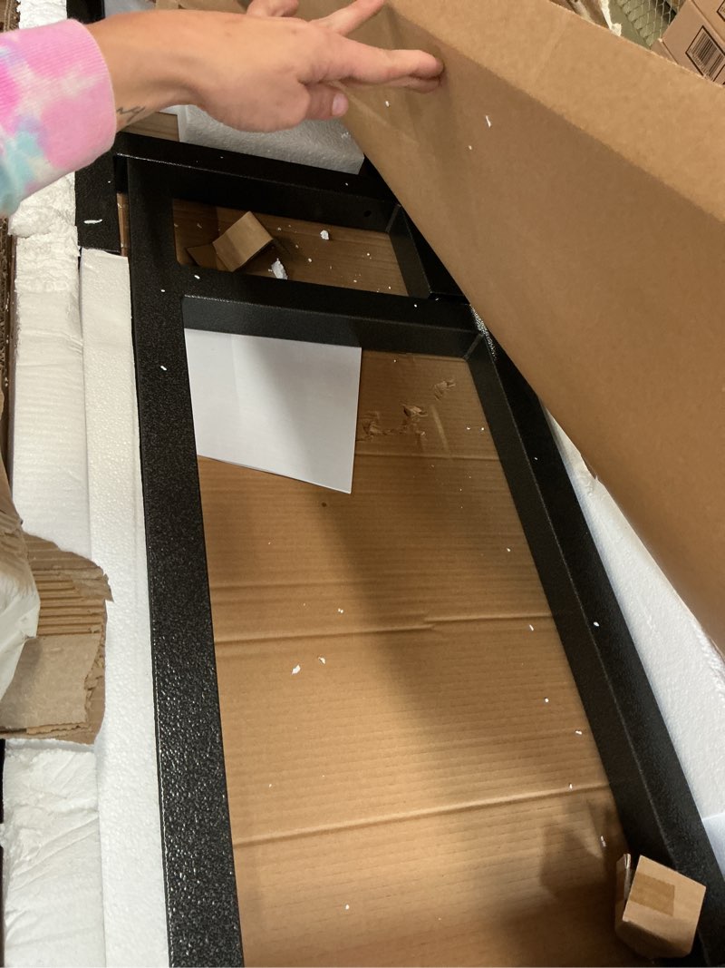 Condition photo showing As Is for incomplete no top ready to assemble 66.5 in. w x 39 in. h x 20 in. d hardwood top workbench