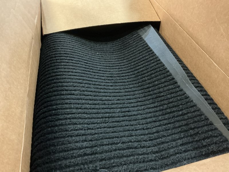 Condition photo showing Good Condition for unimat traffic guard door mat, 4´x 6´, heavy duty waterproof doormat, stain and fade resistant welcome mats, durable rubber backing, low pro le entryway rug, shoe and boot scraper, black