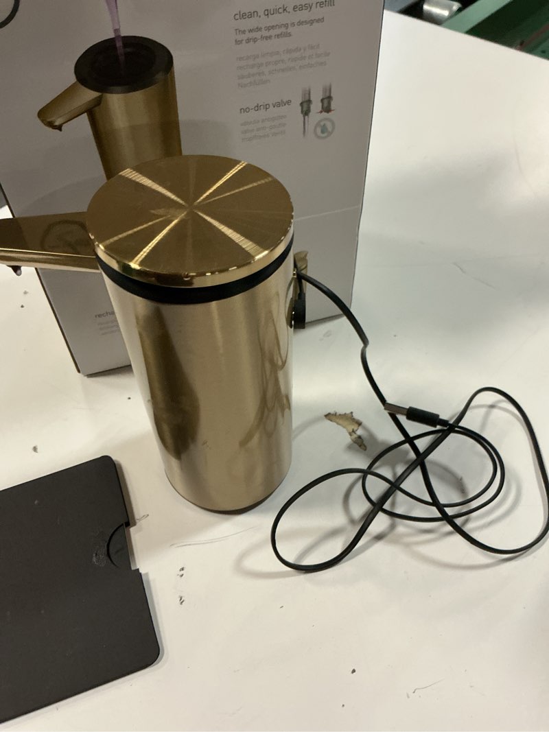 Condition photo showing As Is for simplehuman 9 oz. touch-free automatic rechargeable sensor pump, brass stainless steel, new brass 9 oz.