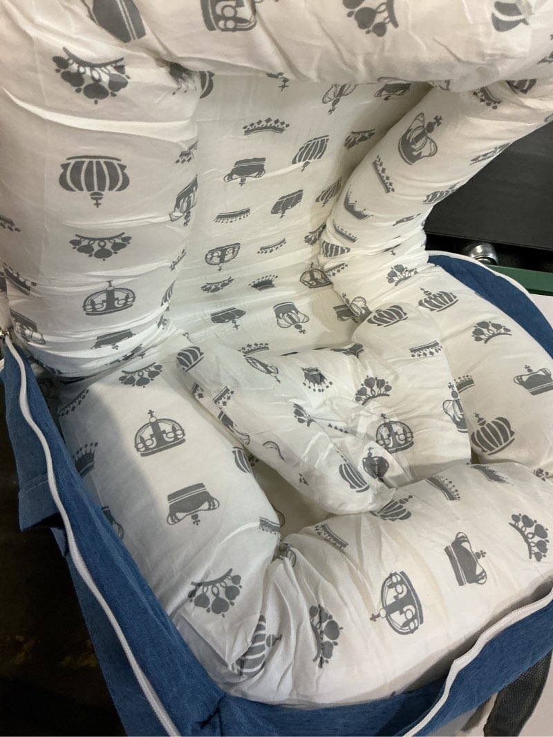 Condition photo showing As Is for Portable Baby Lounger - Foldable Infant Lounge with Adjustable U-Shaped Bumper & Storage Bag, Breathable Cotton Snug Spot for Supervised Rest & Play at Home or On The Go,Blue Crown blue and white