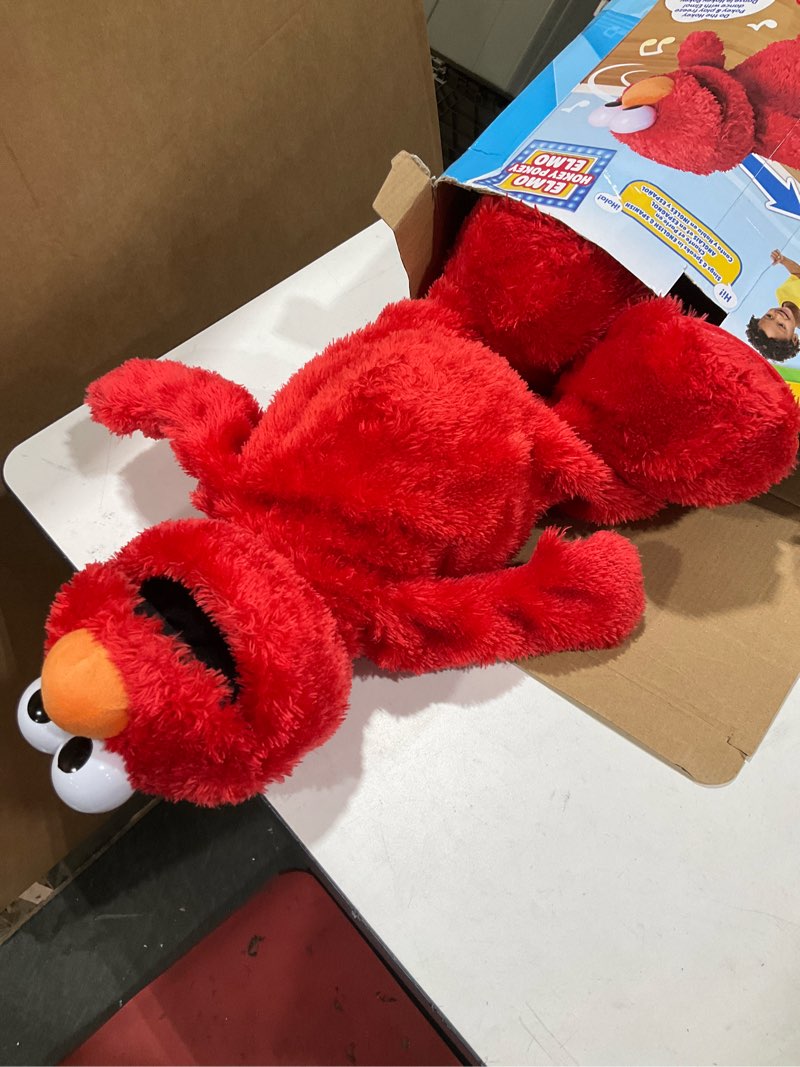 Condition photo showing As Is for sesame street hokey pokey elmo 14” interactive plush toy, sings, dances & plays music, bilingual stuffed animal for pretend play, soft & huggable, for girls and boys, ages 18 months+ by just play