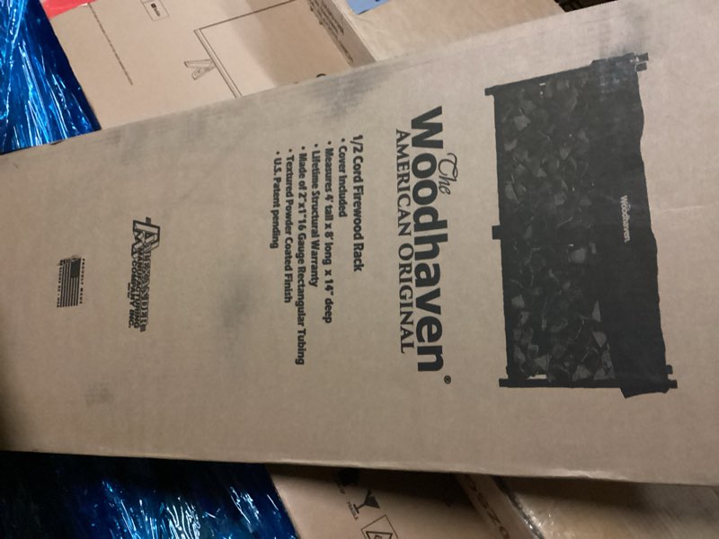 Condition photo showing New/Like New for Woodhaven 8 Foot 1/2 Cord Firewood Log Rack With Optional Cover - Made In USA - Outdoor Use Lifetime Structural Warranty - Black Texture Powder Coat Finish - Made With Heavy Duty Steel