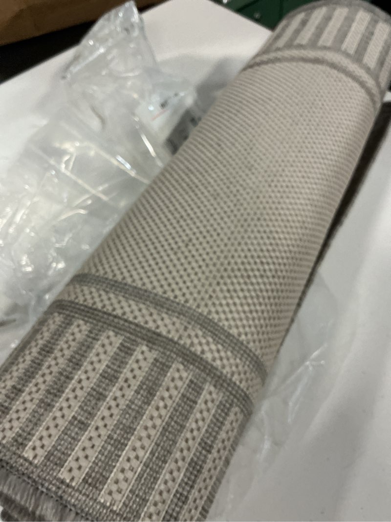Condition photo showing Good Condition for nuloom asha light grey/ivory, 2' x 8', casual, striped border, soft and cozy, high traffic, easy clean, durable runner for indoor/outdoor patio, deck, porch, garden, courtyard light grey 2' x 8' (rectangular)