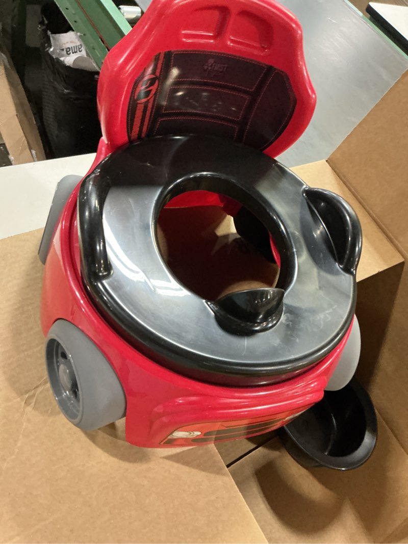 Condition photo showing As Is for the first years training wheels racer potty training toilet - race car training potty - includes detachable toddler toilet seat and kids potty - ages 18 months and up 1 count (pack of 1) car