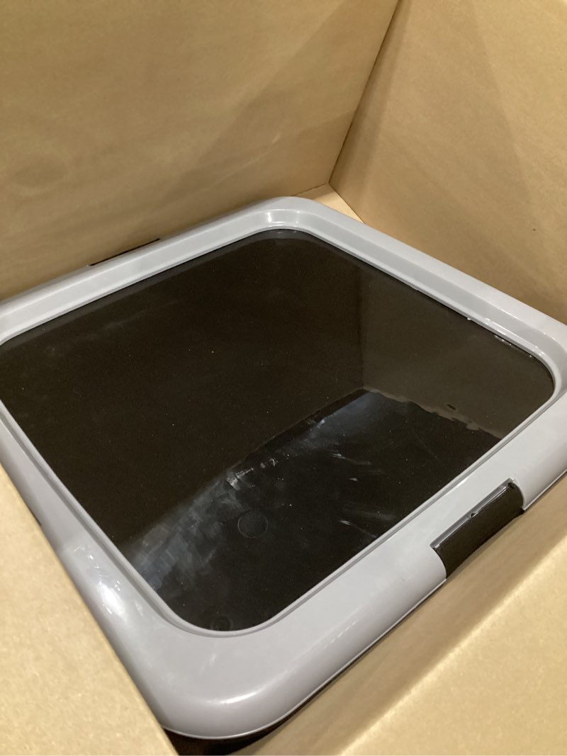 Condition photo showing As Is for iris usa pee pad holder for dogs and puppies, potty training tray with secured latches, non-skid feet, leak protection, easy clean surface, fits 22"x 22" puppy pads size or larger, black/gray 22" x 22" black/gray