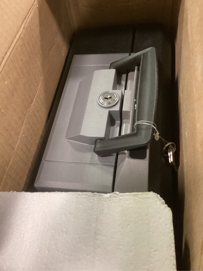 Condition photo showing Good Condition for SentrySafe Fireproof Safe Box with Key Lock, Chest Safe with Carrying Handle to Secure Money, Jewelry, Documents, 0.25 Cubic Feet, 6.3 x 15.3 x 12.1 Inches, 1160