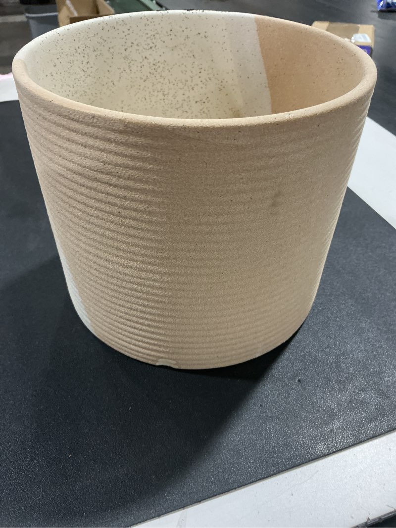 Condition photo showing As Is for Amazon Basics Fluted Ceramic Round Planter, 8-inch, White White 8-Inch