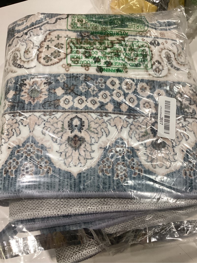Condition photo showing Good Condition for medium sized blue washable rug