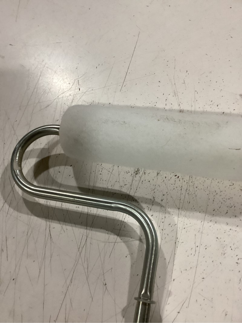 Condition photo showing As Is for unkown paint roller
