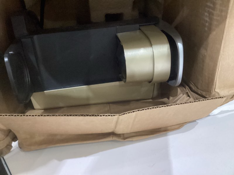 Condition photo showing As Is for keurig k-elite single serve k-cup pod coffee maker, with strength and temperature control, iced coffee capability, 8 to 12oz brew size, programmable, brushed gold