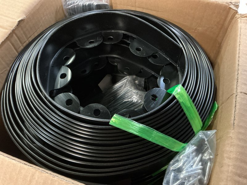 Condition photo showing New/Like New for landscape edging, 1.5" x 100' plastic garden edging with 120 pcs metal spikes, flexible garden border for lawn, landscaping, flower beds black 1.5in x 100ft